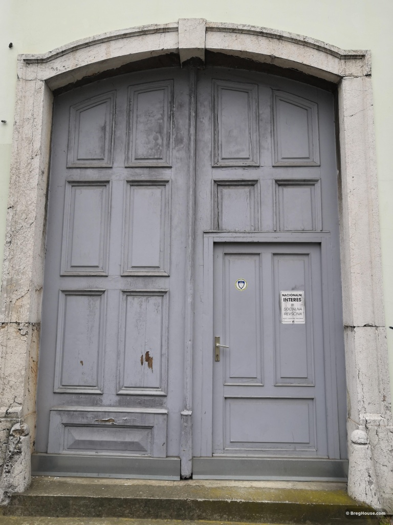 Large grey door in Ljubljana, Slovenia